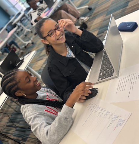 Girls Code Savannah Summer camp students collaborating in building the new Foiled Pretty website